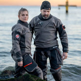 Male and female divers wearing santi edge drysuits